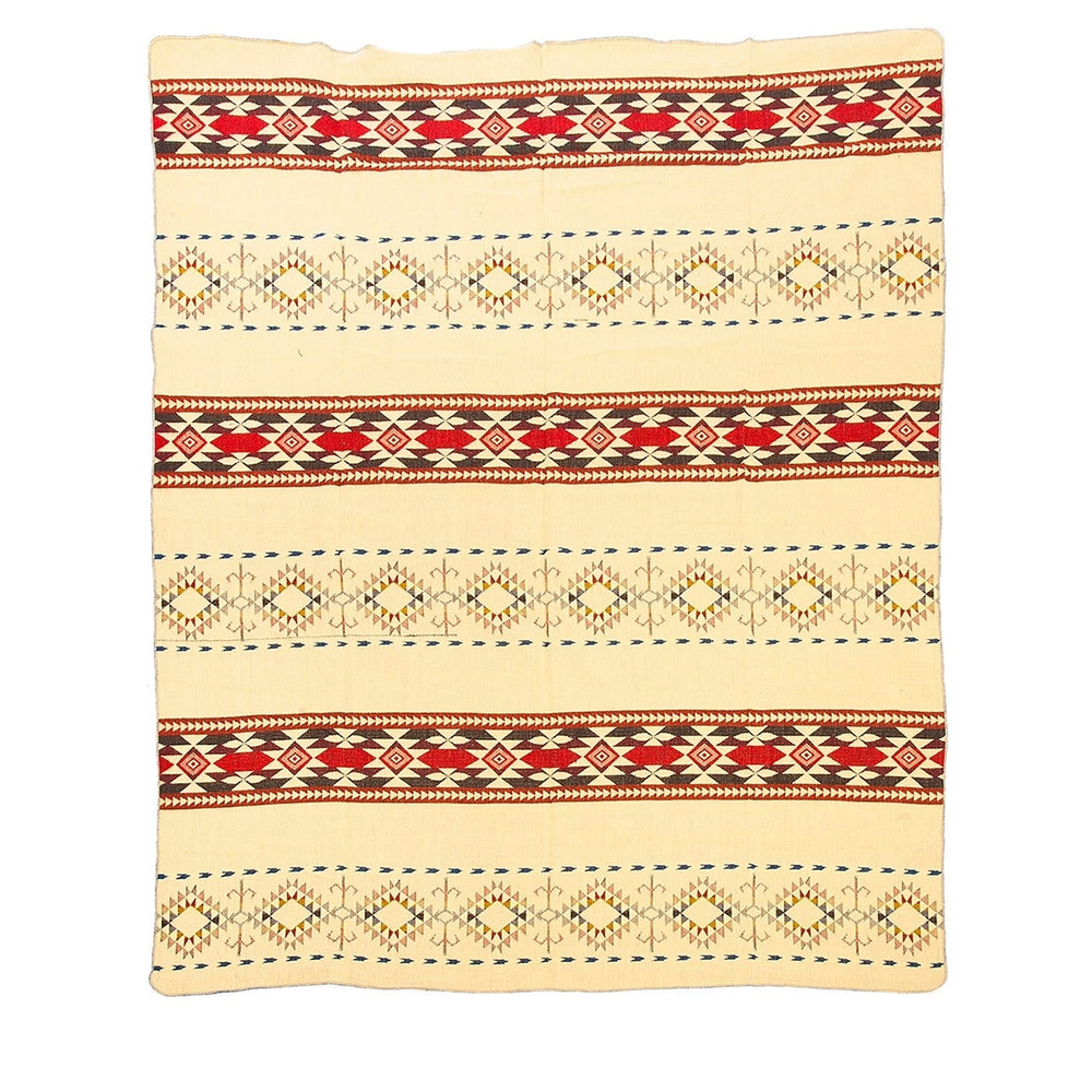 Ganze Ansicht der Rückseite der Alpaka-Decke 'Cotopaxi Mehrfarbig' mit Blau- und Türkistönen auf dunklem Hintergrund.