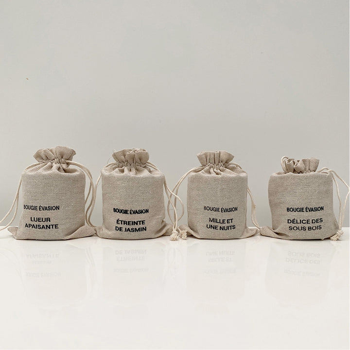 Kerze "Waldgenuss" mit Orangenduft im Stoffbeutel mit Zugband