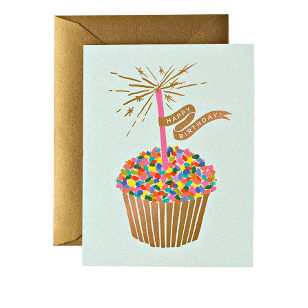 Geburtstagskarte mit großem Cupcake voller bunter Streusel und Wunderkerze mit „Happy Birthday“-Banner.