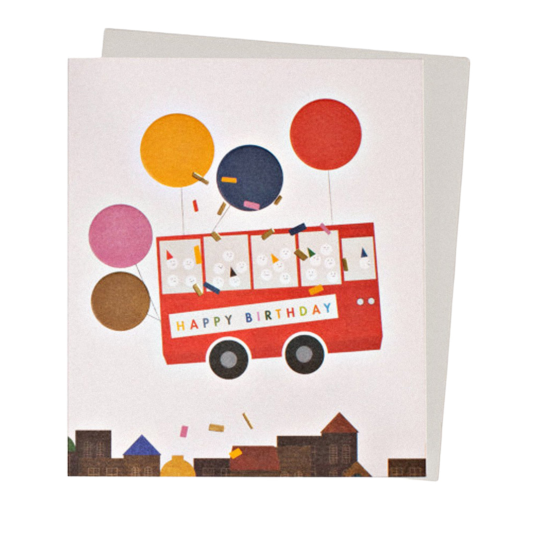 Geburtstagskarte mit „Happy Birthday“-Schriftzug, Partybus und Ballons.