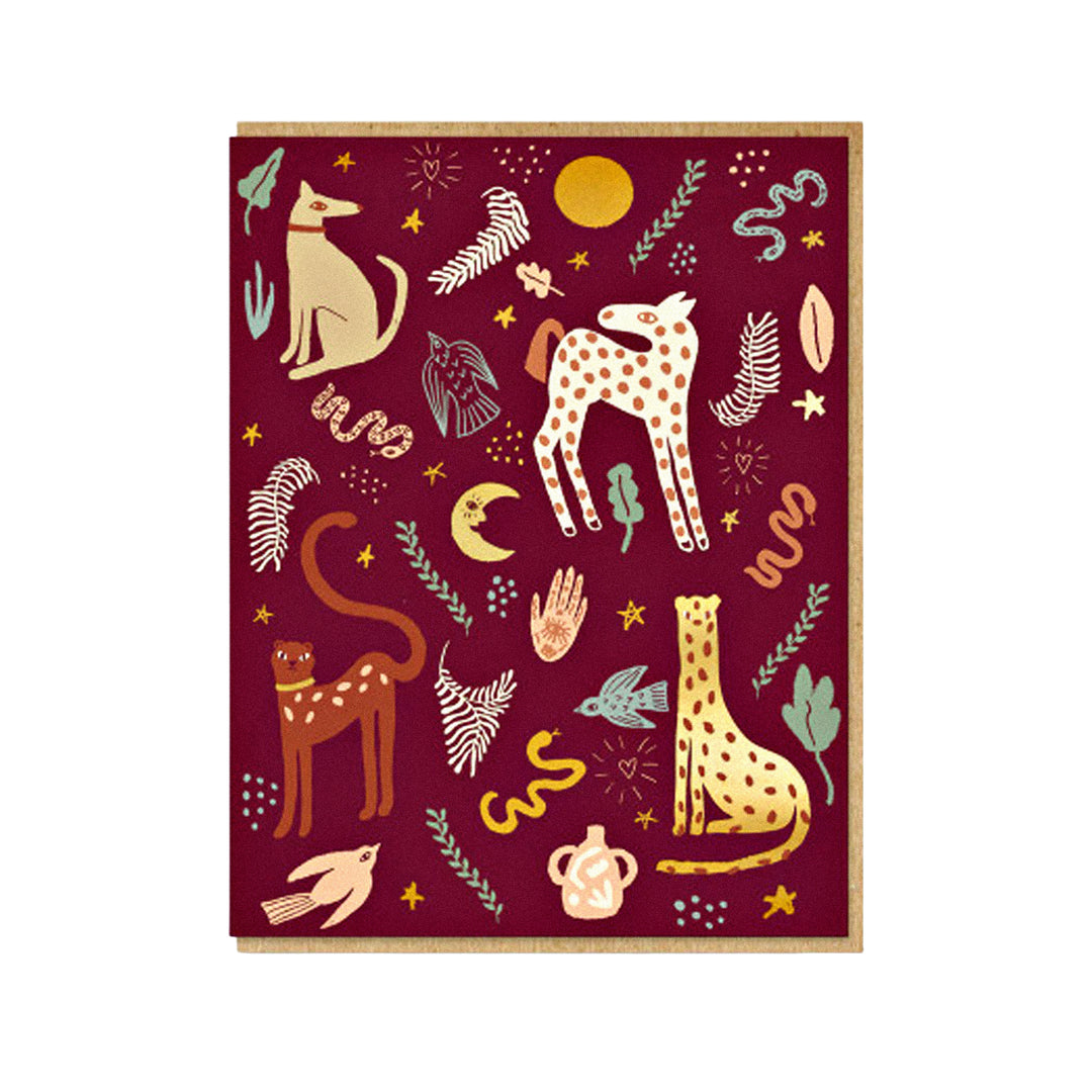 Künstlerische Grußkarte in Bordeaux mit Wüstenlandschaft, Tieren und Symbol-Illustrationen.
