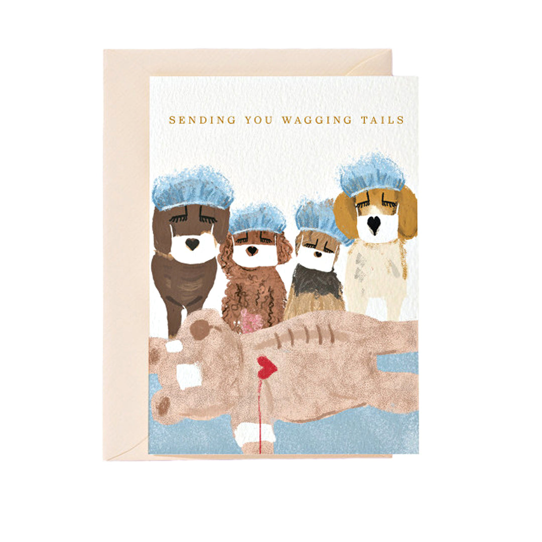 Gute-Besserung-Karte mit Hunden in Trichtern und „Sending you wagging tails“-Schriftzug.