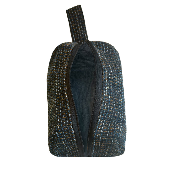 Elegante Kosmetiktasche aus grauem Stoff mit Trageschlaufe