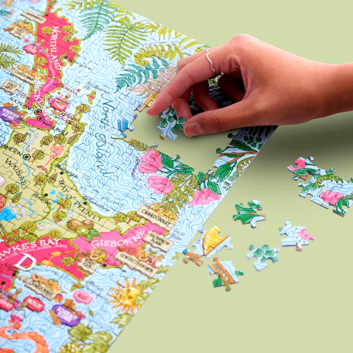 Illustrierte Karte der Nord- und Südinsel Neuseelands mit Weinregionen.