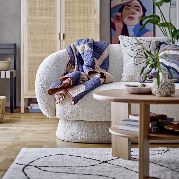 Teppich in Creme mit schwarzem abstraktem Linienmuster