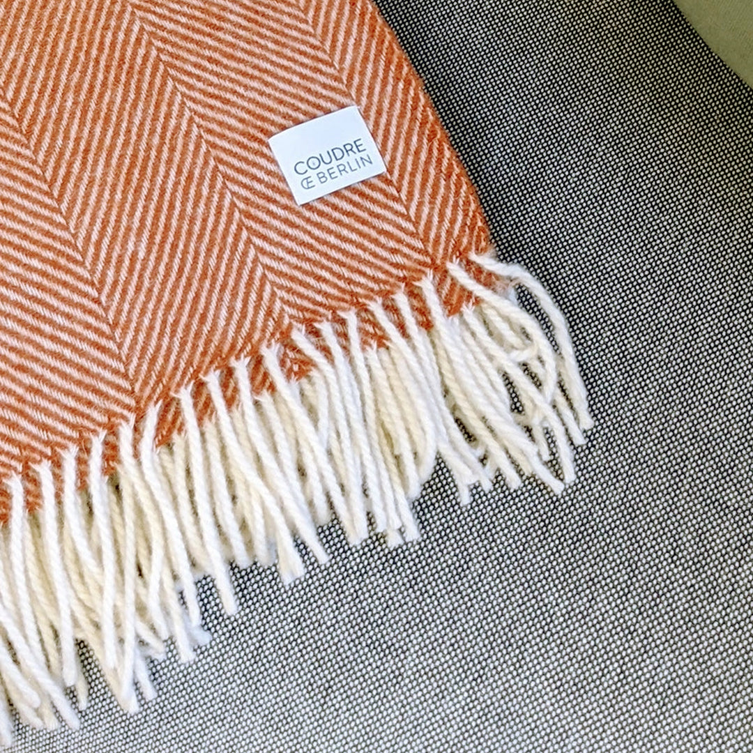 Wolldecke mit Fischgrätmuster in Orange -  130 x 170 cm